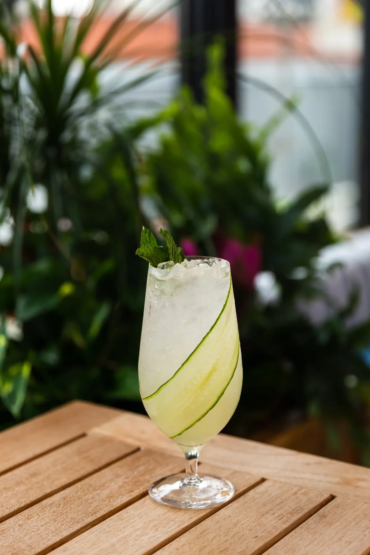 Cucumber highball on a rooftop table